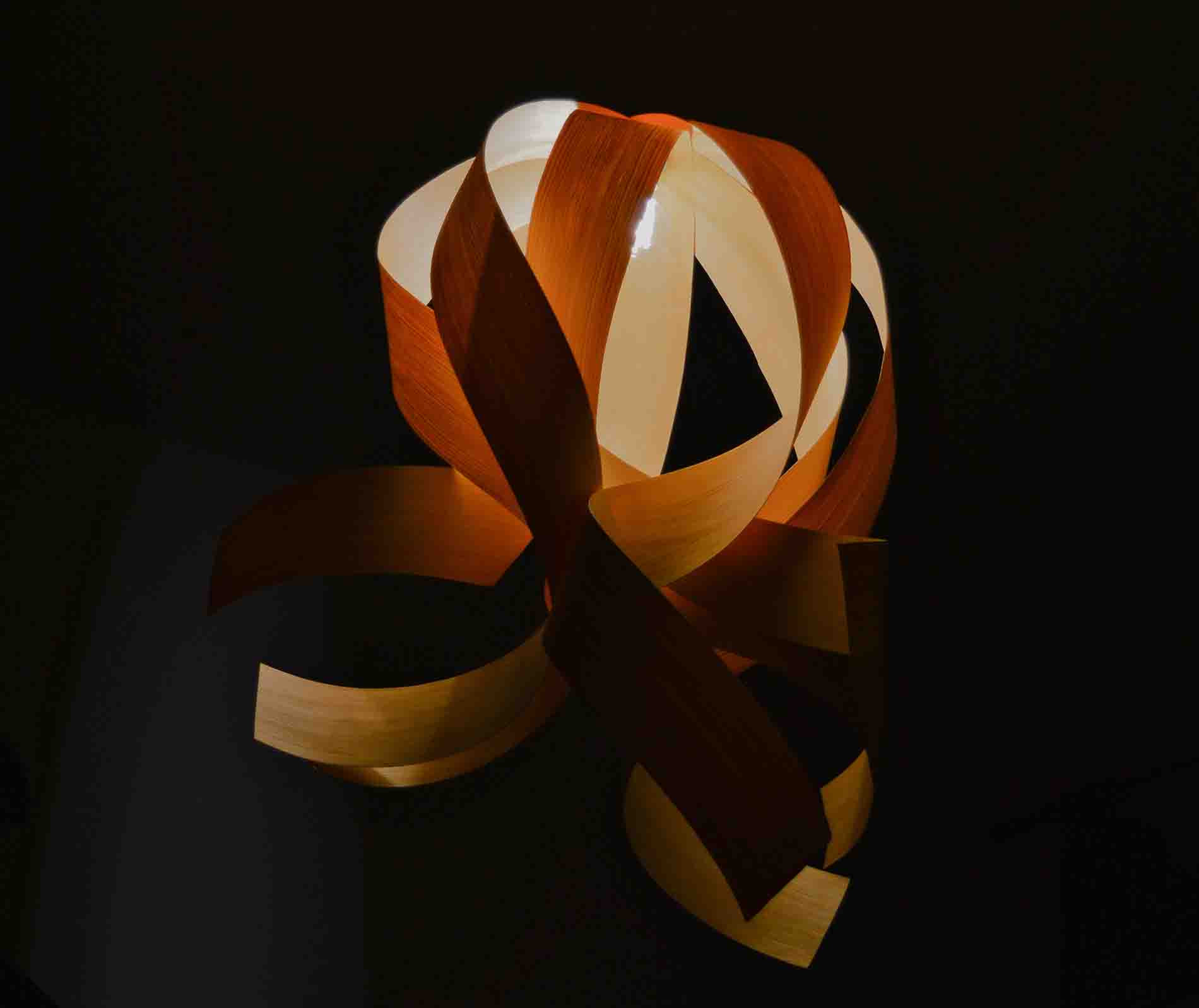 dimly lit image of a handmade wooden lampshade